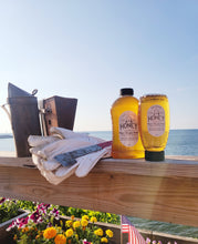 Load image into Gallery viewer, Pure, raw honey in &quot;no mess&quot; squeezable plastic jars
